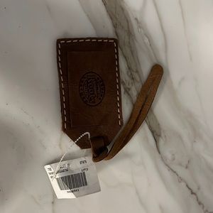 NWT LEATHER BAGGAGE TAG! By Roots brand!